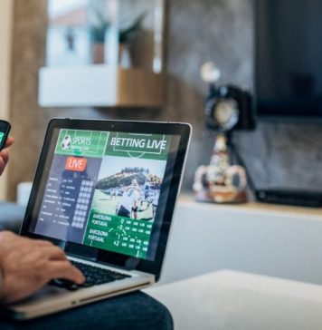 The Growth Of Sports Betting Online Someone sitting and sports betting online